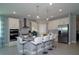 Modern kitchen with stainless steel appliances and an island at 86 Spaderdock Ln, Apopka, FL 32712