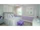 Charming bedroom with golf-themed decor and purple accents at 5143 Firebush Dr, Apopka, FL 32712