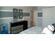 Modern bedroom with gray and white color scheme and stylish decor at 5143 Firebush Dr, Apopka, FL 32712
