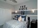 Star Wars themed bedroom with a comfortable bed and custom wall decor at 5143 Firebush Dr, Apopka, FL 32712