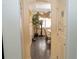 View of the hallway that leads to dining area with hardwood floors at 1304 Ocoee Apopka Rd, Ocoee, FL 34761