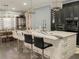 Modern kitchen with large island and stylish barstools at 1304 Ocoee Apopka Rd, Ocoee, FL 34761
