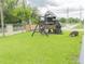 Wooden playset in spacious backyard at 1304 Ocoee Apopka Rd, Ocoee, FL 34761