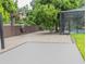 Large brick paver patio with fire pit and seating at 1304 Ocoee Apopka Rd, Ocoee, FL 34761
