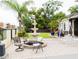 Front yard with fountain, seating, and a swing at 1304 Ocoee Apopka Rd, Ocoee, FL 34761
