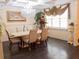 Elegant dining room with a large chandelier and decorative accents at 1304 Ocoee Apopka Rd, Ocoee, FL 34761