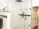 Large walk-in shower with glass enclosure and rainfall shower head at 1304 Ocoee Apopka Rd, Ocoee, FL 34761