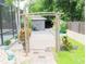 Landscaped pathway leads to backyard patio at 1304 Ocoee Apopka Rd, Ocoee, FL 34761