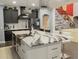 Spacious kitchen with island, stainless steel appliances, and modern cabinetry at 1304 Ocoee Apopka Rd, Ocoee, FL 34761