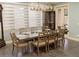 Bright dining room featuring a large table and access to the kitchen at 1304 Ocoee Apopka Rd, Ocoee, FL 34761