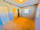 Simple bedroom with carpet flooring and closet at 1817 Demastus Ln, Ocoee, FL 34761