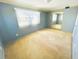 Bright bedroom with mirrored closet and carpet at 1817 Demastus Ln, Ocoee, FL 34761
