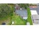 Aerial view of a home with a large backyard and outbuildings at 1817 Demastus Ln, Ocoee, FL 34761
