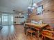 Dining area with wood table and chairs, near kitchen at 853 Cr 484, Lake Panasoffkee, FL 33538
