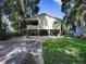 Elevated home exterior with spacious yard at 853 Cr 484, Lake Panasoffkee, FL 33538