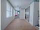 Spacious sunroom with access to bathroom and bedroom at 853 Cr 484, Lake Panasoffkee, FL 33538