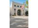 City Hall building, featuring a classic design and Florida flag at 137 S Park Ave, Winter Garden, FL 34787