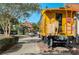 Yellow train caboose on display in Winter Garden at 137 S Park Ave, Winter Garden, FL 34787