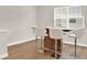 Breakfast bar with four white leather barstools at 137 S Park Ave, Winter Garden, FL 34787