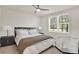 Main bedroom with king-size bed and nightstands at 137 S Park Ave, Winter Garden, FL 34787