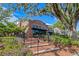 Plant Street Market brick building with outdoor seating and landscaping at 137 S Park Ave, Winter Garden, FL 34787