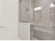 Walk-in shower with glass enclosure and tiled walls at 137 S Park Ave, Winter Garden, FL 34787