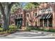 Brick building housing Local restaurant, featuring outdoor seating at 137 S Park Ave, Winter Garden, FL 34787
