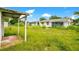 Overgrown backyard view from the house at 1620 Morin St, Eustis, FL 32726