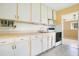 Kitchen with light wood cabinets and appliances at 1620 Morin St, Eustis, FL 32726
