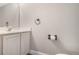 Small bathroom with white vanity and neutral walls at 15847 Wilkinson Dr, Clermont, FL 34714