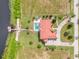 Bird's eye view of home, pool, dock and lakefront property at 7616 Lily Ct, Groveland, FL 34736