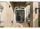 Inviting front entrance with a decorative door and tiled flooring at 114 Compass Rose Dr, Groveland, FL 34736