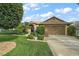 Single Gathering home with landscaped yard at 114 Compass Rose Dr, Groveland, FL 34736