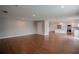 Open living room with hardwood floors and kitchen views at 1340 Banbridge Dr, Kissimmee, FL 34758