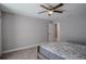 Bedroom with ceiling fan and neutral decor at 1340 Banbridge Dr, Kissimmee, FL 34758