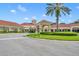 Community clubhouse with Mediterranean architecture and landscaping at 3921 Doune Way, Clermont, FL 34711