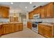Well-equipped kitchen, granite counters, wood cabinets at 3921 Doune Way, Clermont, FL 34711
