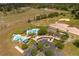 Aerial view of community pool and surrounding area at 3921 Doune Way, Clermont, FL 34711
