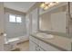Bathroom with tub, toilet and vanity at 3921 Doune Way, Clermont, FL 34711
