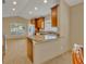 Kitchen with granite countertops and wood cabinets at 3921 Doune Way, Clermont, FL 34711