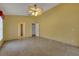 Bright bedroom with tile floors and ceiling fan at 3921 Doune Way, Clermont, FL 34711