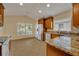 Bright kitchen, stainless steel appliances, granite countertops at 3921 Doune Way, Clermont, FL 34711