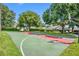 Well-maintained basketball court with green and red surfaces at 3921 Doune Way, Clermont, FL 34711