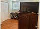 Cozy bedroom with hardwood floors and ample closet space at 2524 Good Homes Rd, Orlando, FL 32818