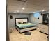 Basement bedroom with dresser and tiled floor at 2524 Good Homes Rd, Orlando, FL 32818