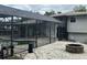 Screened pool and patio area with fire pit at 2524 Good Homes Rd, Orlando, FL 32818