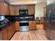 Kitchen with wood cabinets and stainless steel appliances at 2524 Good Homes Rd, Orlando, FL 32818