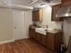 Efficient kitchen featuring a farmhouse sink and ample cabinetry at 2524 Good Homes Rd, Orlando, FL 32818