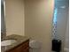 Bathroom with granite vanity and shower stall at 2524 Good Homes Rd, Orlando, FL 32818