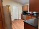 Modern kitchen with stainless steel appliances and granite countertops at 2524 Good Homes Rd, Orlando, FL 32818